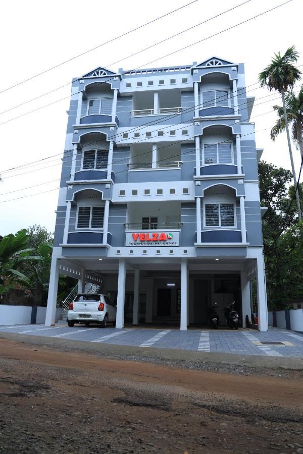 Yelza Hotel And Residence Alwaye Екстер'єр фото